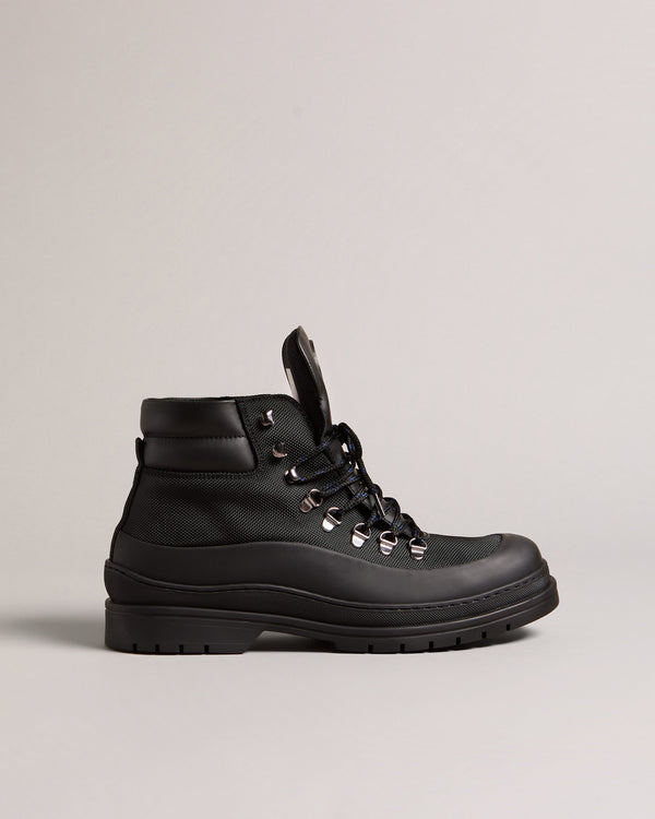 JAKSONN-Boots-Calling all adventure takers. JAKSONN are great shoes for the outdoors that don't compromise on style. The leather and nylon upper gives these boots a more refined look than your average hiking boots, while the rubber sole adds durability and traction. By purchasing this product, you are supporting responsible leather manufacturing through the Leather Working Group. Hiking boots Leather and nylon upper Rubber sole Lace up Ted Baker branded Padded ankle Comes in Ted Baker branded packaging- Ted